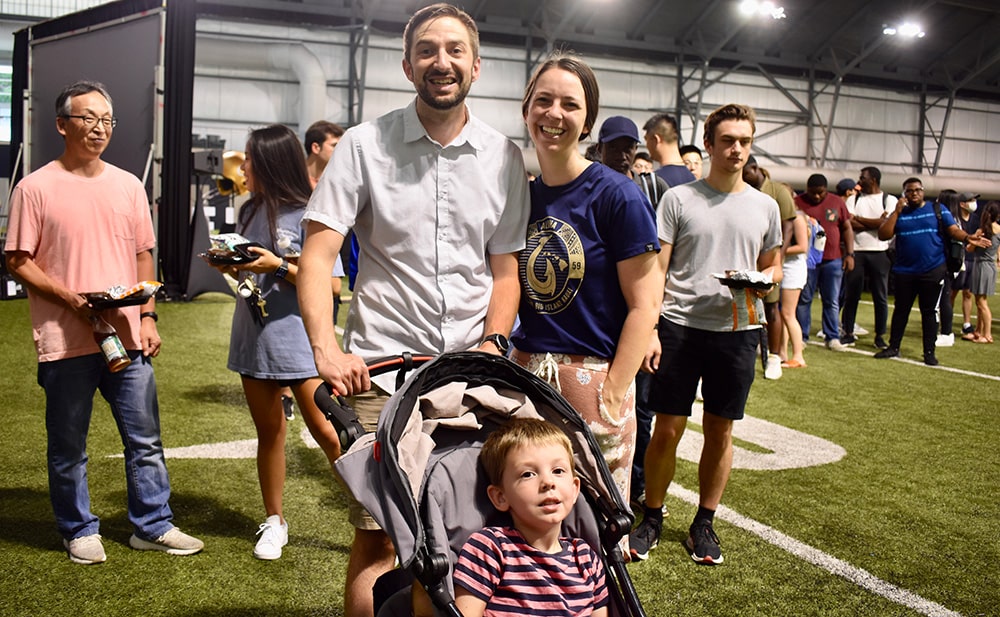 Graduate students with their kid